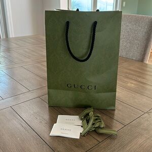 GUCCI green store bag from purchase. With GUCCI ribbon
